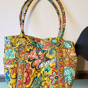 A snap side bag from Vera Bradley.